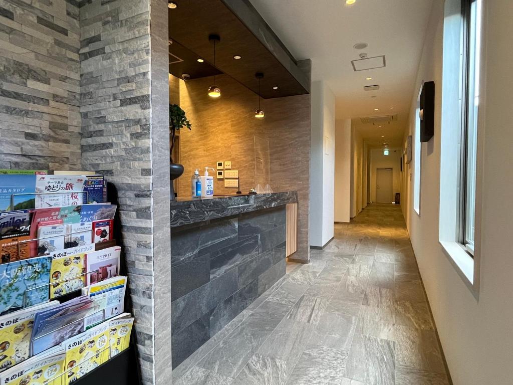 Kuchyň nebo kuchyňský kout v ubytování Plaza In Kanku Hotel