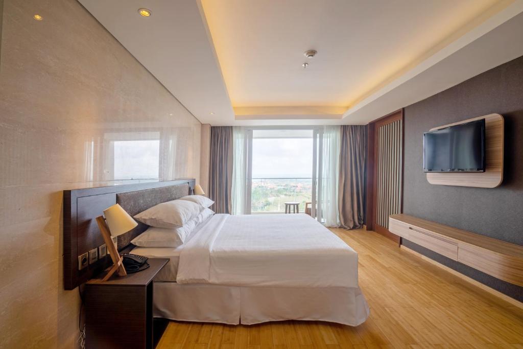 Letto o letti in una camera di Four Points by Sheraton Bali, Ungasan