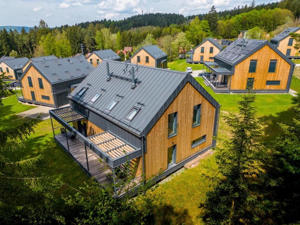 an overhead view of a large house with a metal roof at Holiday House U Hájenky 12P Lipno Home in Lipno nad Vltavou