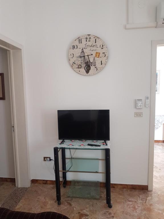 TV a/nebo společenská místnost v ubytování casa al mare kalispera