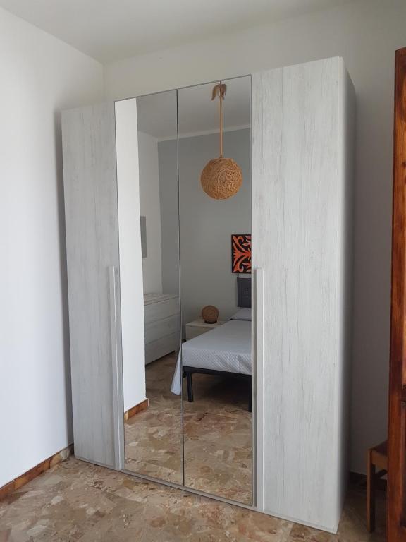 Postel nebo postele na pokoji v ubytování casa al mare kalispera