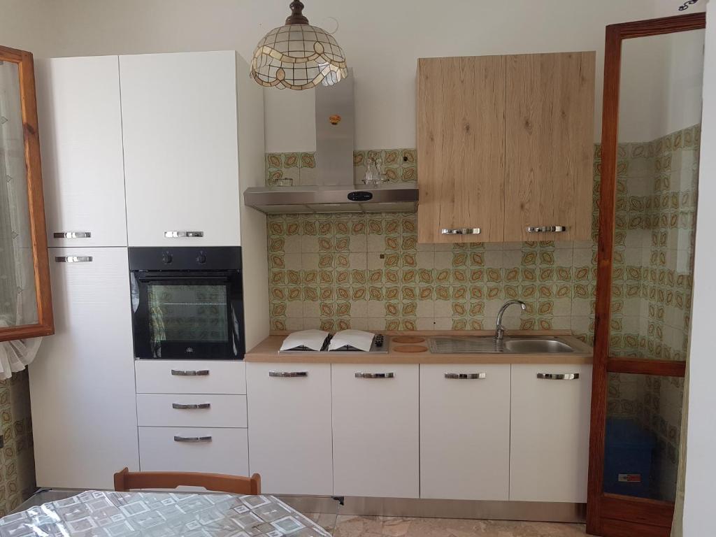 Kuchyň nebo kuchyňský kout v ubytování casa al mare kalispera