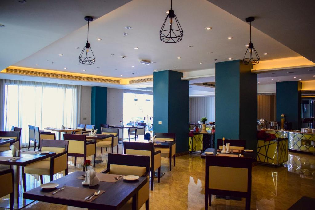Restaurace v ubytování The Secure Inn Hotel Muscat