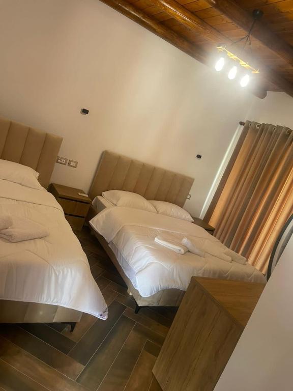 Postel nebo postele na pokoji v ubytování Guest House Bracaj