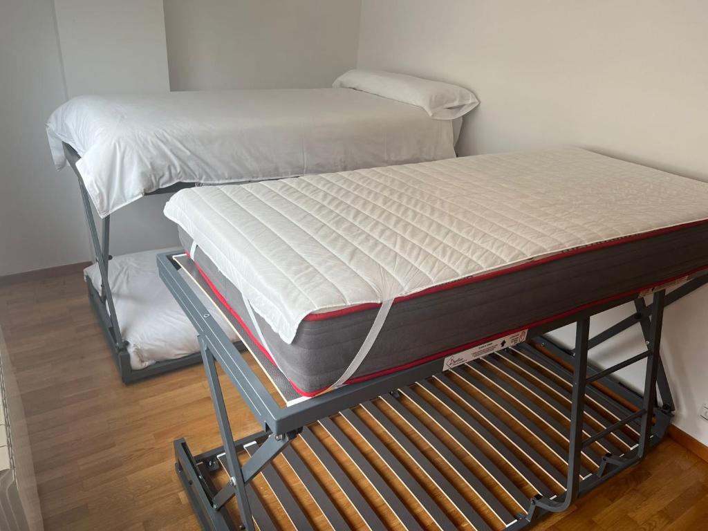 Postel nebo postele na pokoji v ubytování Playa Nigrán