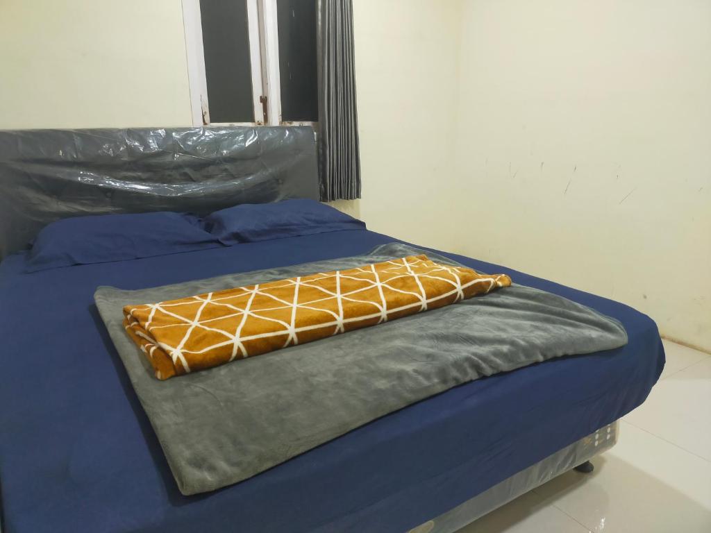 Postel nebo postele na pokoji v ubytování Bromo Semesta Guesthouse