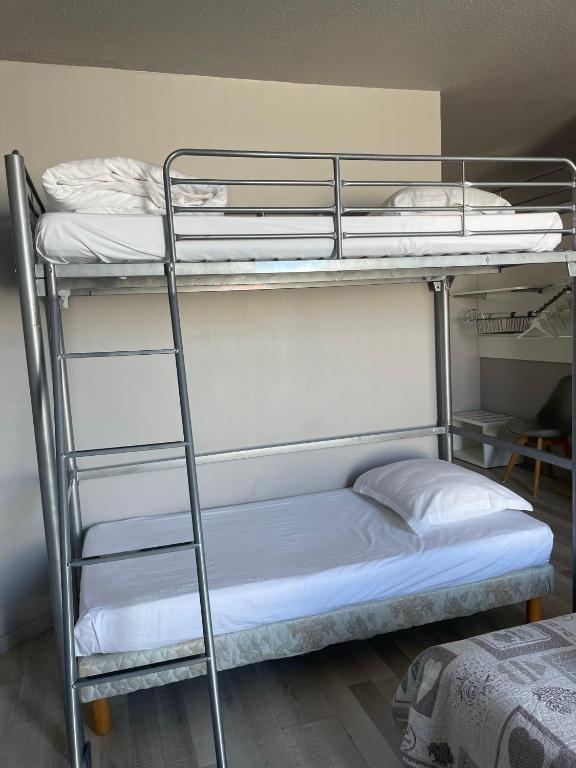 Postel nebo postele na pokoji v ubytování Hotel La Clé