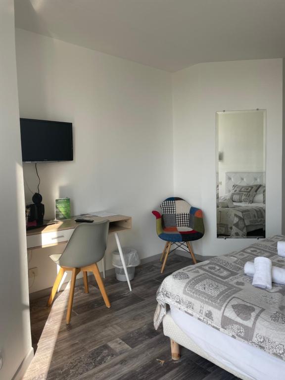 Postel nebo postele na pokoji v ubytování Hotel La Clé