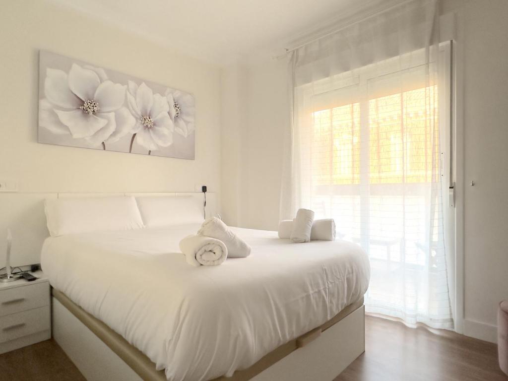 Posteľ alebo postele v izbe v ubytovaní AYALA Malaga City Center 6PAX