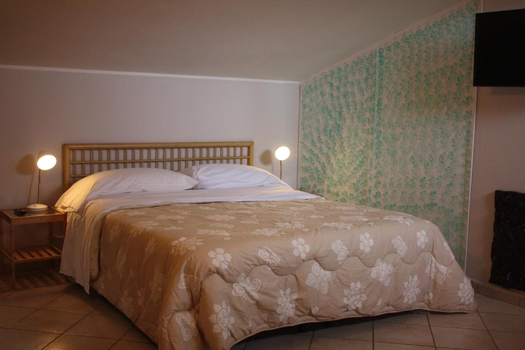 Postel nebo postele na pokoji v ubytování Aethalia Bed and Breakfast