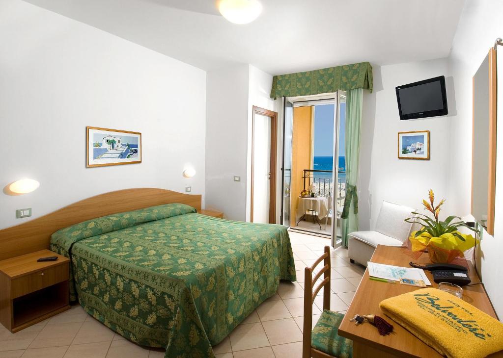 Postel nebo postele na pokoji v ubytování Hotel Belvedere