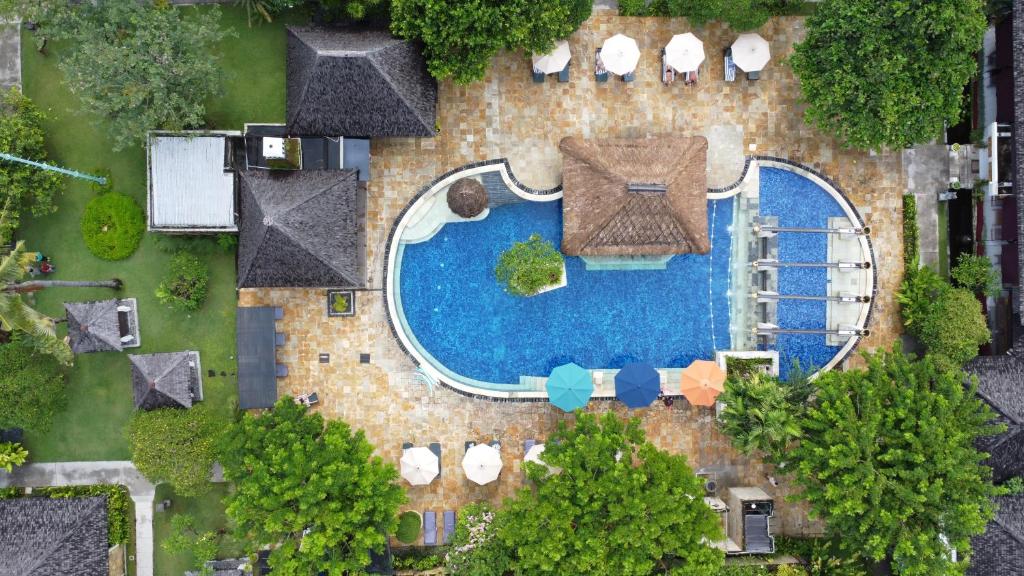 an overhead view of a swimming pool in a resort at Rama Beach Resort and Villas in Kuta