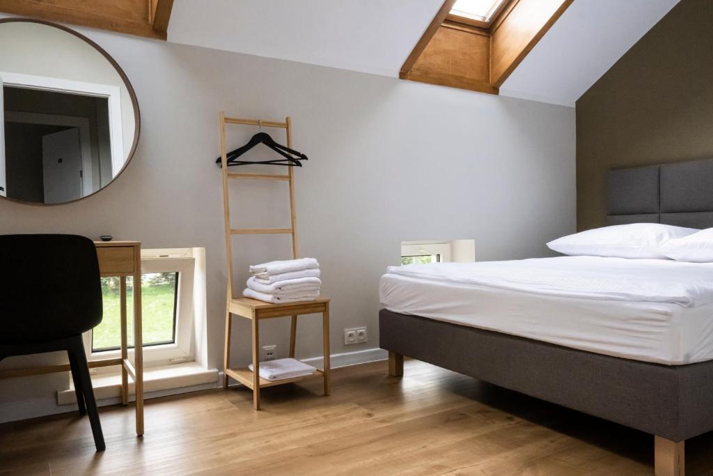 Postel nebo postele na pokoji v ubytování ORKANA House