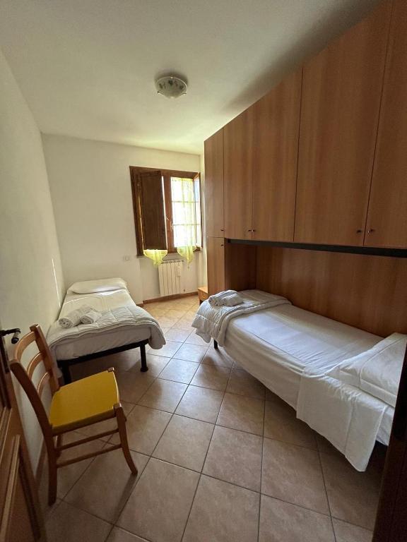 Postel nebo postele na pokoji v ubytování Residence San Francesco
