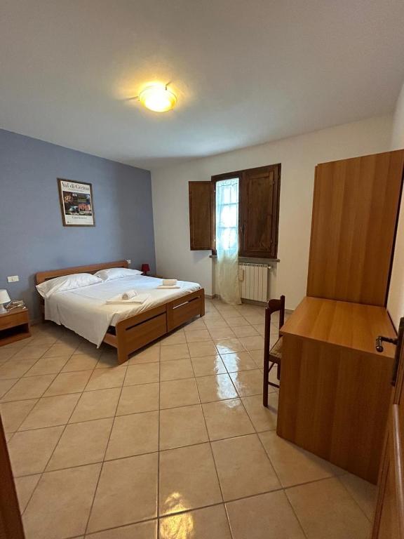 Postel nebo postele na pokoji v ubytování Residence San Francesco