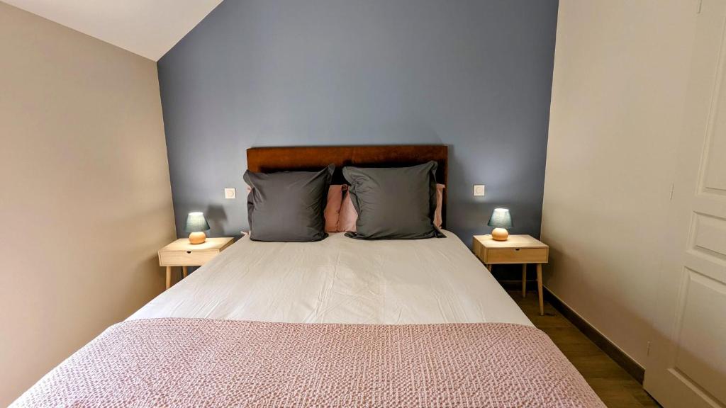 Postel nebo postele na pokoji v ubytování Le Clos des écureuils - chambres d'hôtes