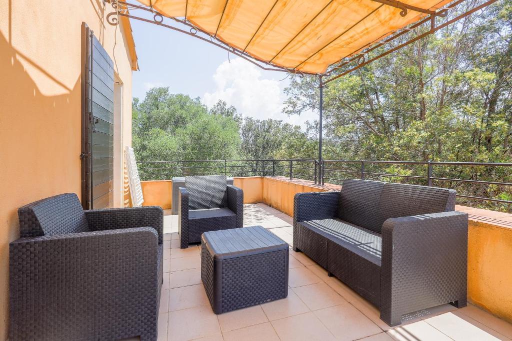 Khu vực ghế ngồi tại Casa Corsica - Appt climatisé proche de la plage