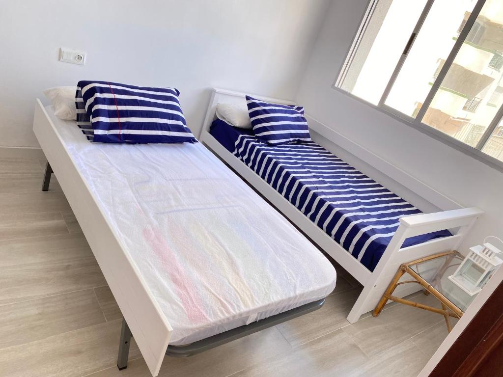 Postel nebo postele na pokoji v ubytování NUEVO !!! Apartamento Peñíscola Playa con piscinas y tenis