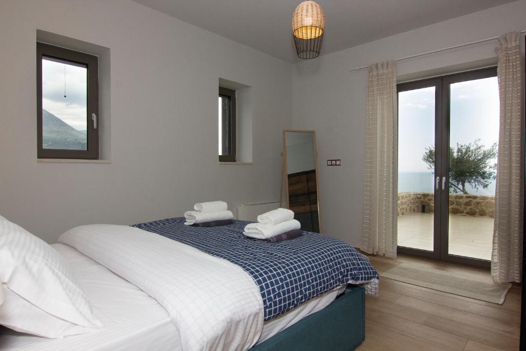 A bed or beds in a room at Kika Residences