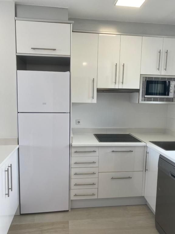 Kuchyň nebo kuchyňský kout v ubytování NUEVO !!! Apartamento Peñíscola Playa con piscinas y tenis