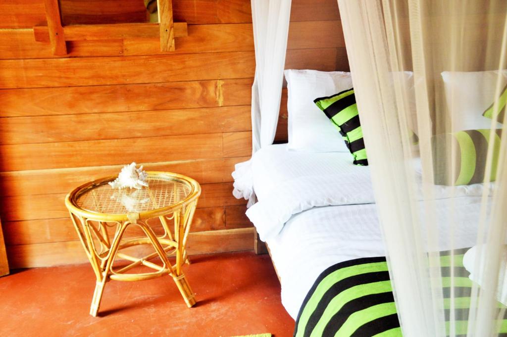 Postel nebo postele na pokoji v ubytování Green cottage Ella