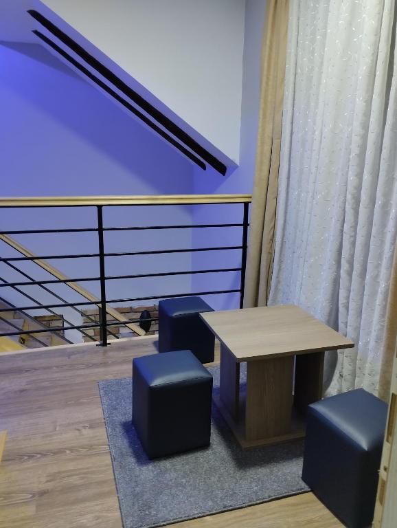 Posezení v ubytování D&M Apartman Dojkinci