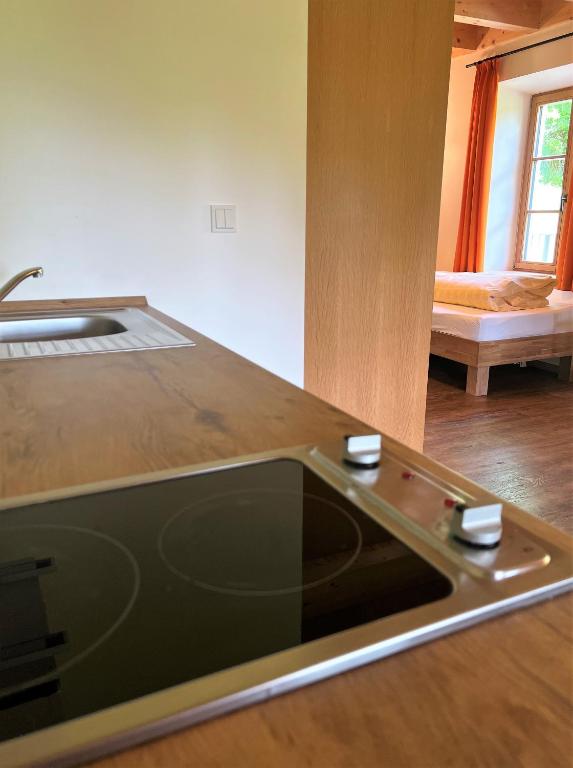 Postel nebo postele na pokoji v ubytování Sunhill Appartments, klimatisiert