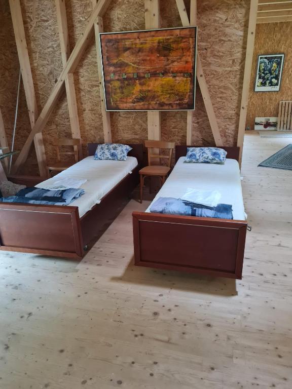 Postel nebo postele na pokoji v ubytování Gasthof Wabitsch