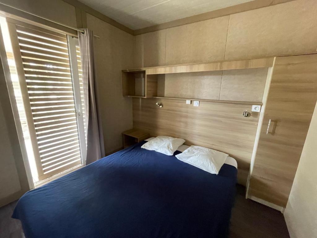 Postel nebo postele na pokoji v ubytování Camping Trinité