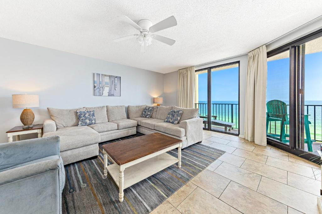 a living room with a couch and a table at Phoenix X 907 in Orange Beach