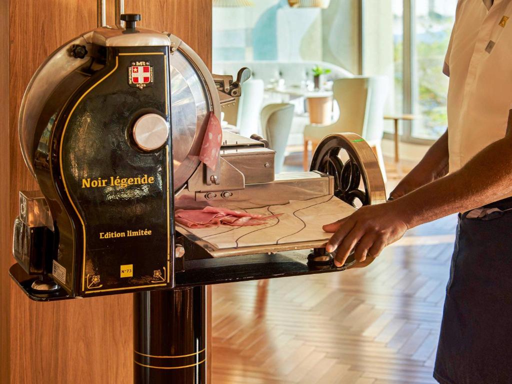 a person is using a not terrible machine at Fairmont Rio de Janeiro Copacabana in Rio de Janeiro