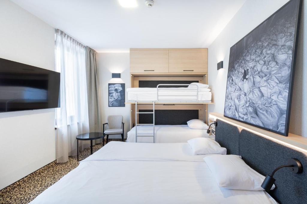Posteľ alebo postele v izbe v ubytovaní Qubus Hotel Gdańsk