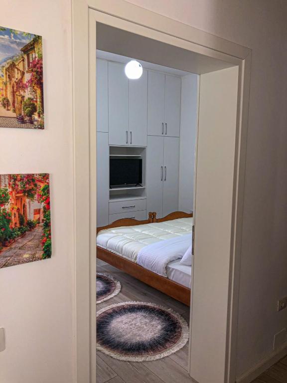 Postel nebo postele na pokoji v ubytování Villa LIKAJ