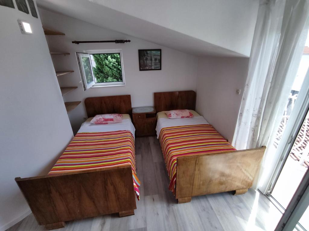 Postel nebo postele na pokoji v ubytování Guest House Periko