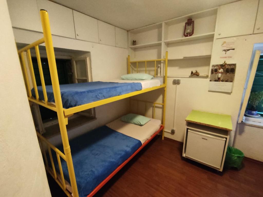 Postel nebo postele na pokoji v ubytování Guest House Periko