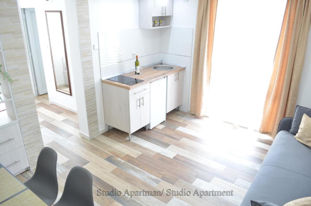 Kuchyň nebo kuchyňský kout v ubytování Apartmani "Nebo"