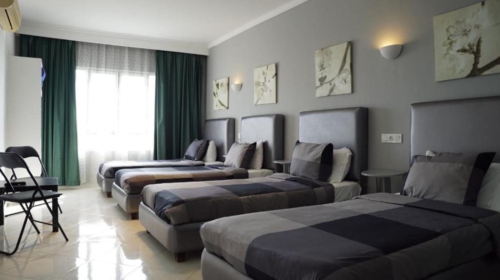 Кровать или кровати в номере hotel azayla