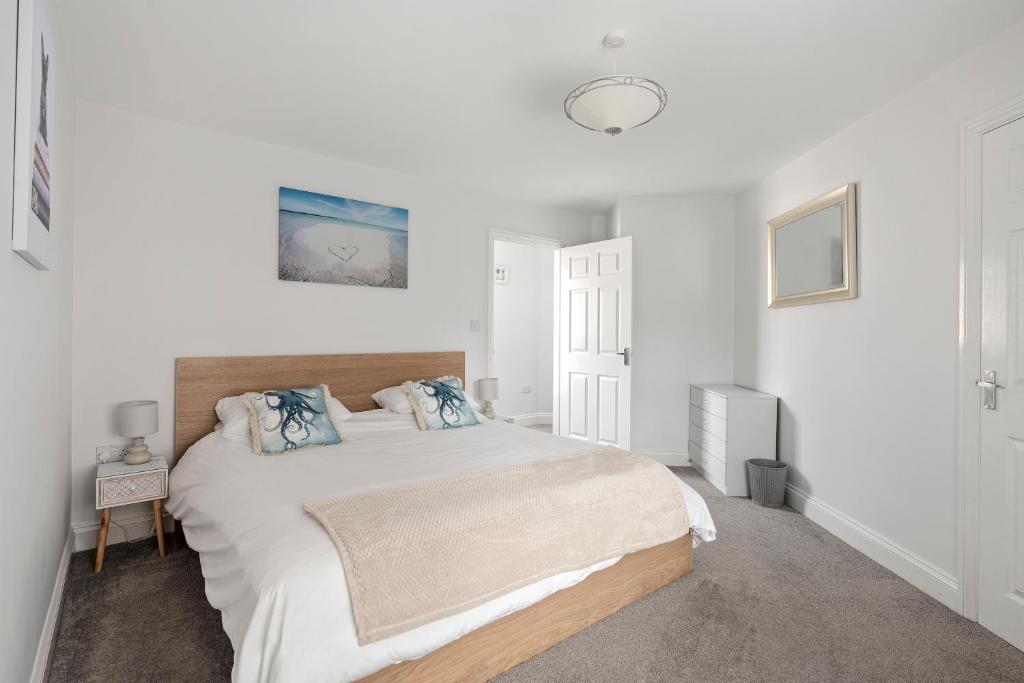 Cama ou camas em um quarto em Beach Front House