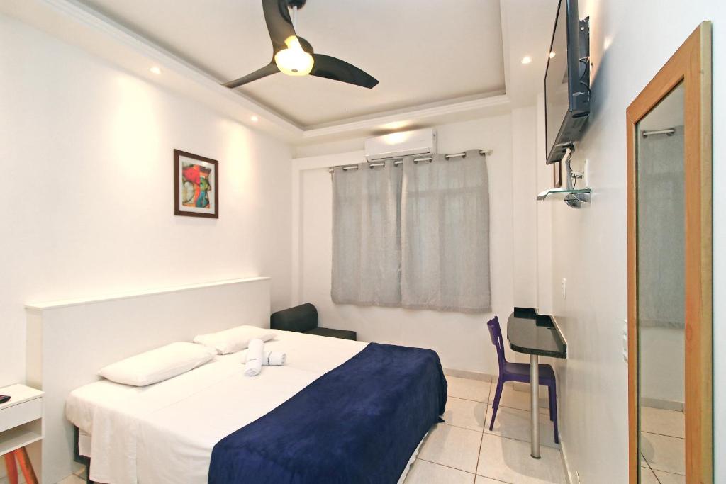 Postel nebo postele na pokoji v ubytování Rio Spot Homes Flat C031A