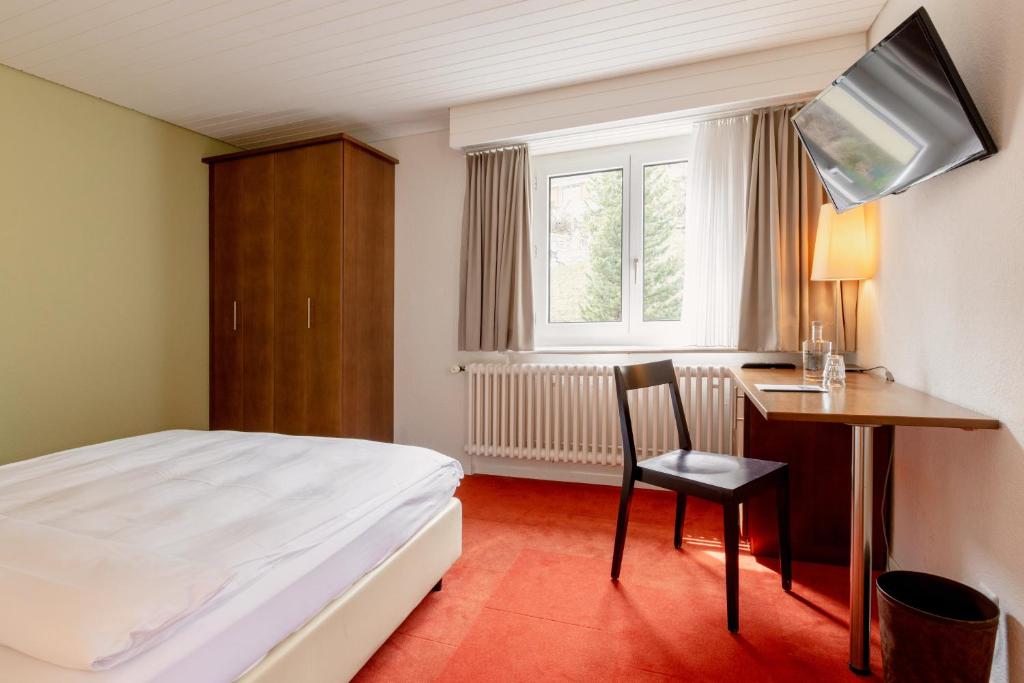 Postel nebo postele na pokoji v ubytování Pension Arosa - Self Check-In