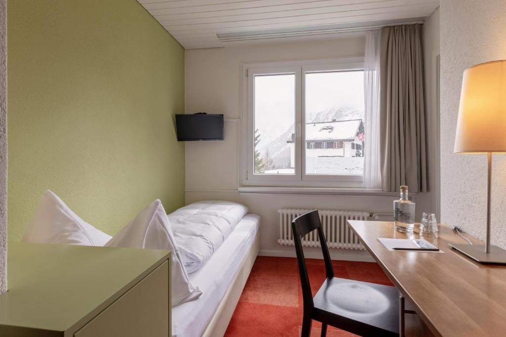 Postel nebo postele na pokoji v ubytování Pension Arosa - Self Check-In
