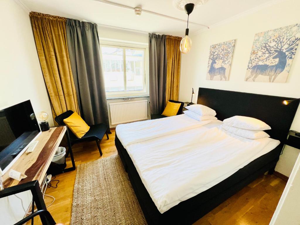 Postel nebo postele na pokoji v ubytování Hotell Siesta
