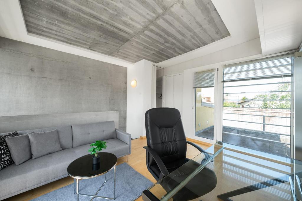 Posezení v ubytování Urban Cube mit Sauna