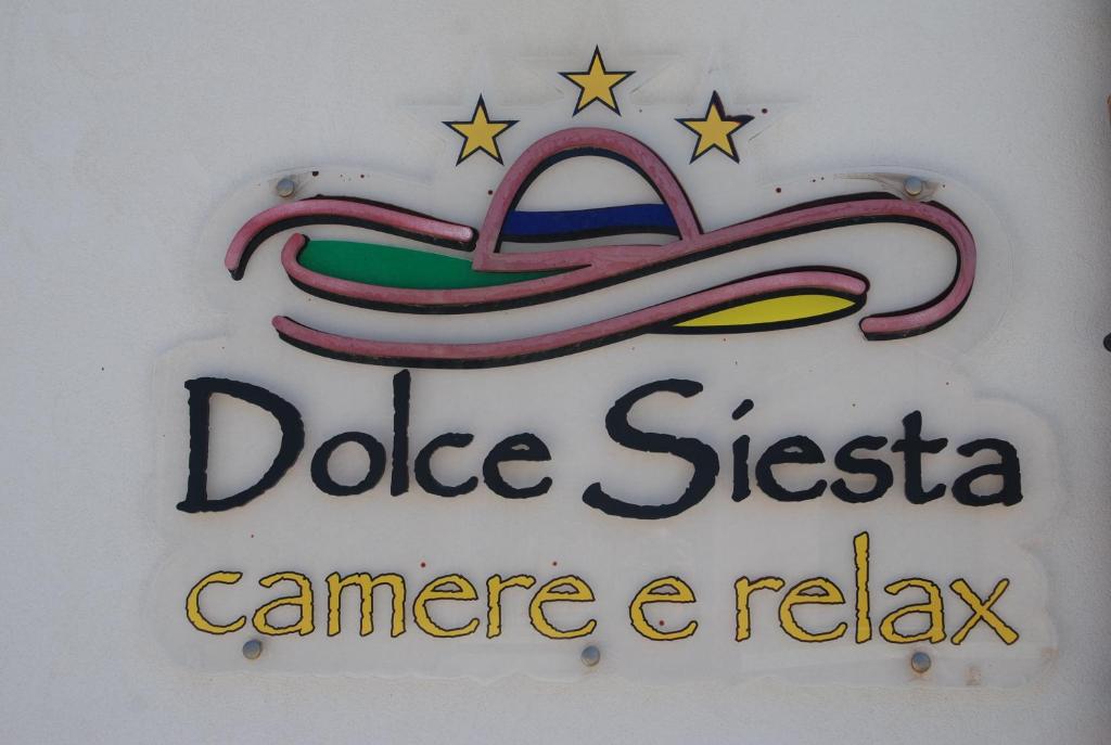 a sign for a d dog stella camera relay at Dolce Siesta in Castelluzzo