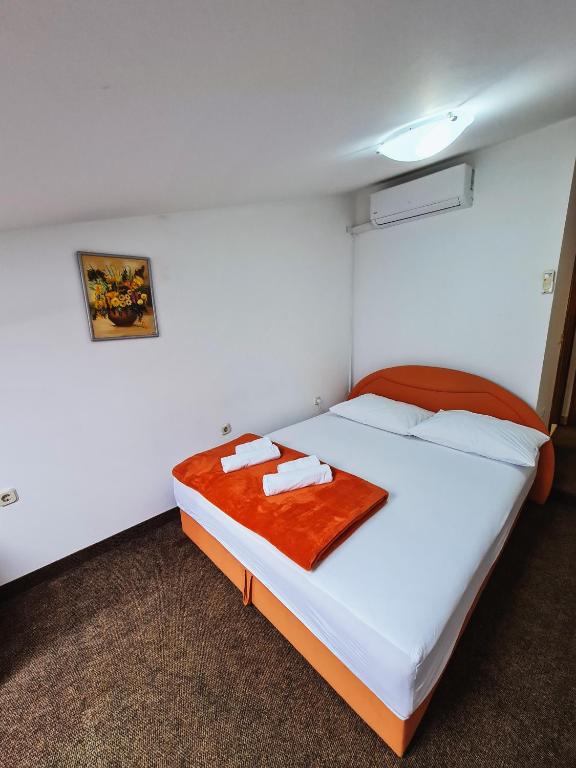 Postel nebo postele na pokoji v ubytování Guest house Davorka