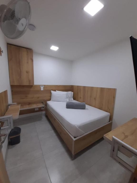 Postel nebo postele na pokoji v ubytování Hotel Park Caribe