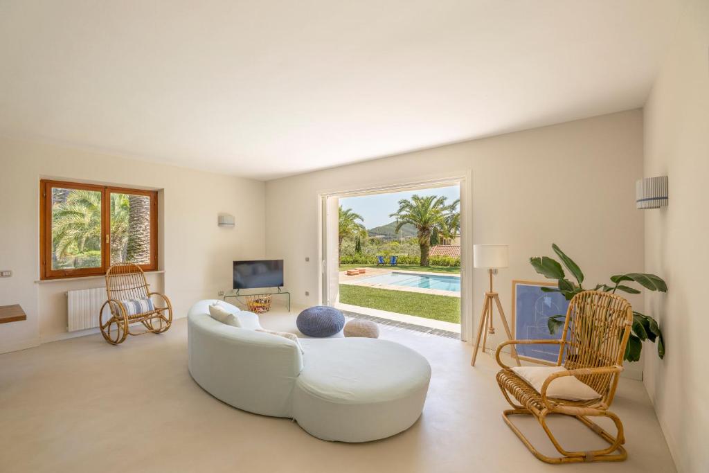 TV a/nebo společenská místnost v ubytování Villa Elle Exclusive Isola d'Elba