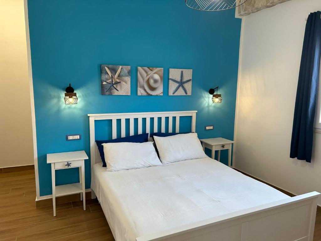 Postel nebo postele na pokoji v ubytování Room On The Beach
