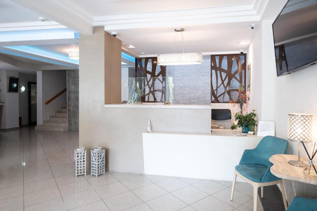 TV a/nebo společenská místnost v ubytování Hotel Akropol