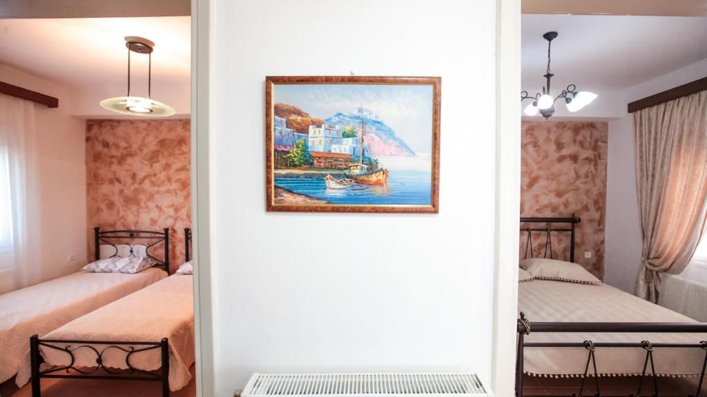 Postel nebo postele na pokoji v ubytování Marialena house